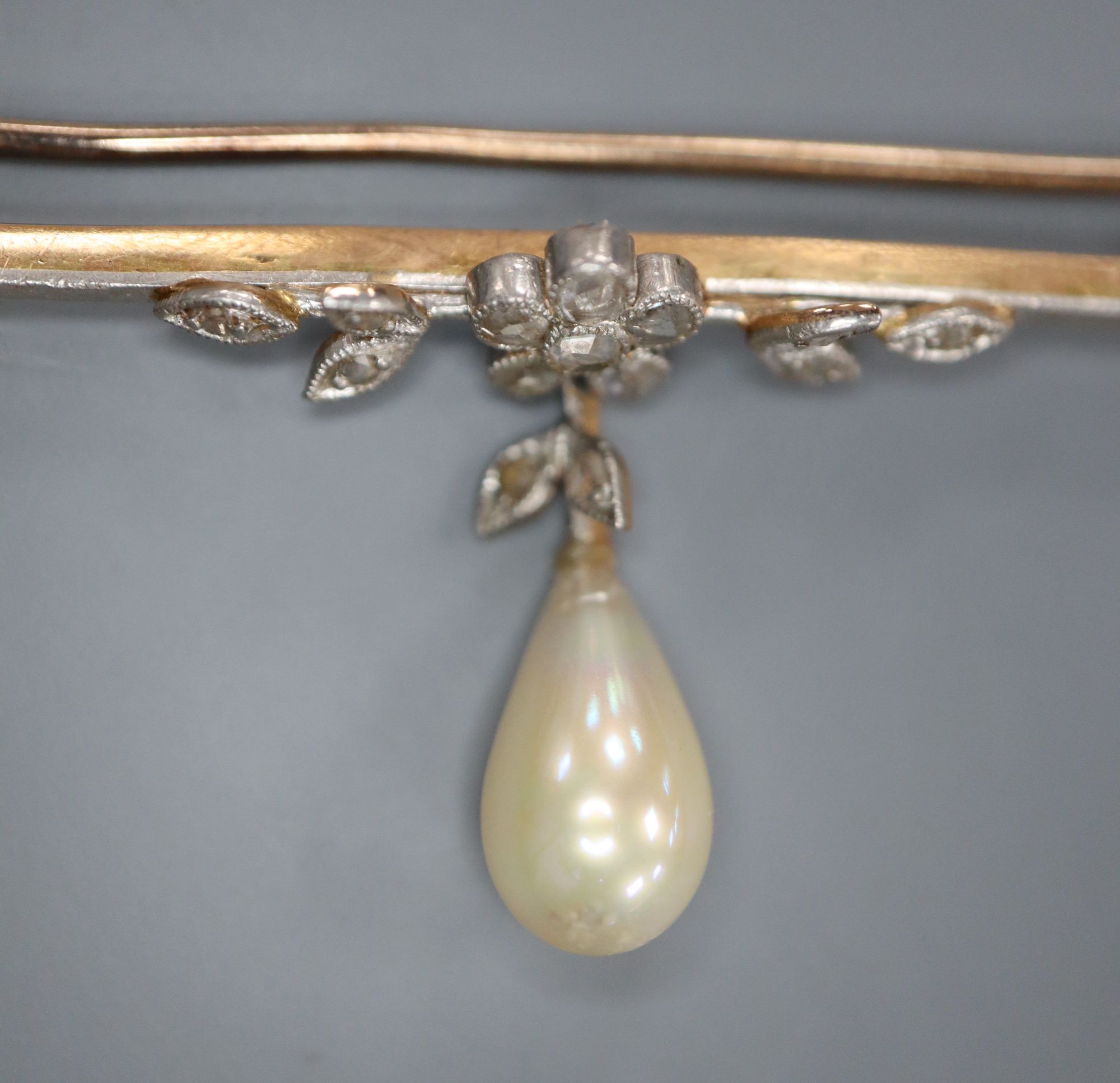 A 1920s yellow metal, rose cut diamond and simulated pearl drop set bar brooch, 52mm, gross 3.6 grams.
